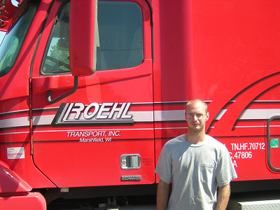 Roehl Driver Trainer next to truck